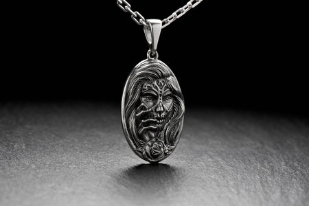 Crafted with intricate detail, this pendant features the iconic Calavera Catrina, a symbol associated with the Day of the Dead celebration, beautifully rendered in sterling silver. (etsy image id: 4963643952)
