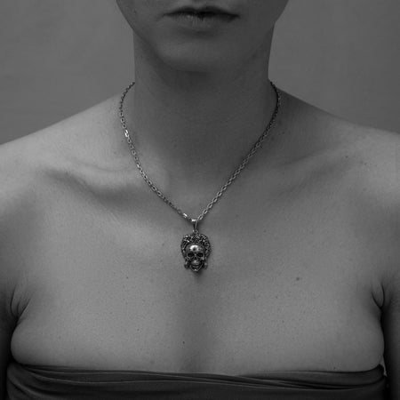 Made from high-quality sterling silver, this pendant has a polished finish that adds a touch of elegance. (etsy image id: 5002355033)