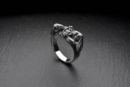 Each ring features intricately designed hare motifs, expertly crafted in sterling silver. The attention to detail brings the hares to life, showcasing their graceful forms, delicate features, and expressive movements. (etsy image id: 5023568428)