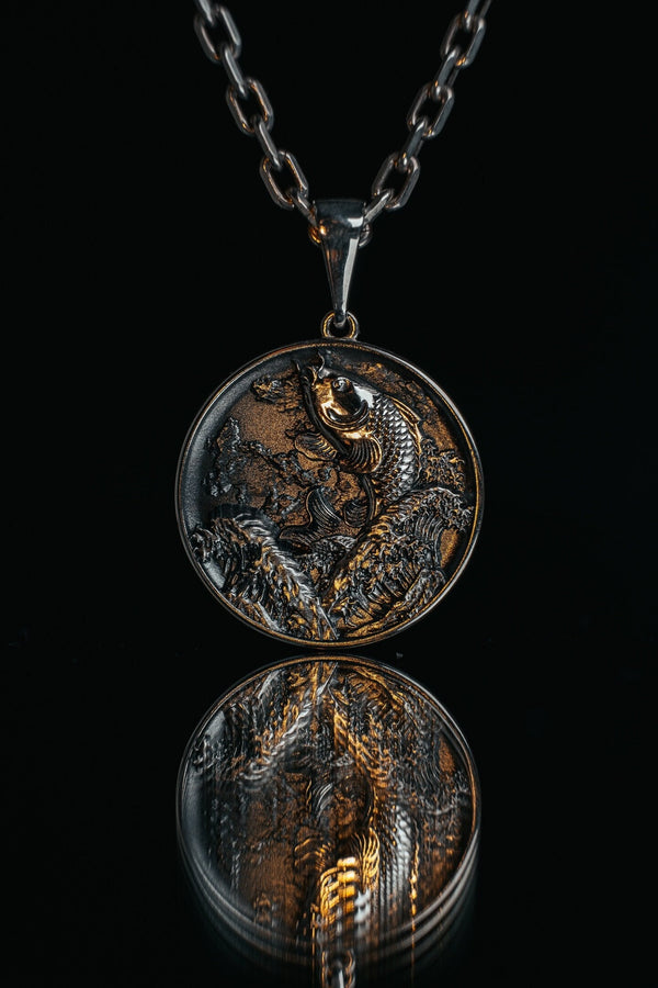 This exquisite pendant showcases the graceful form of a Koi Carp, meticulously crafted in sterling silver. The intricate detailing captures the essence of these magnificent fish, from their flowing fins to their delicate scales. (etsy image id: 5077863619)