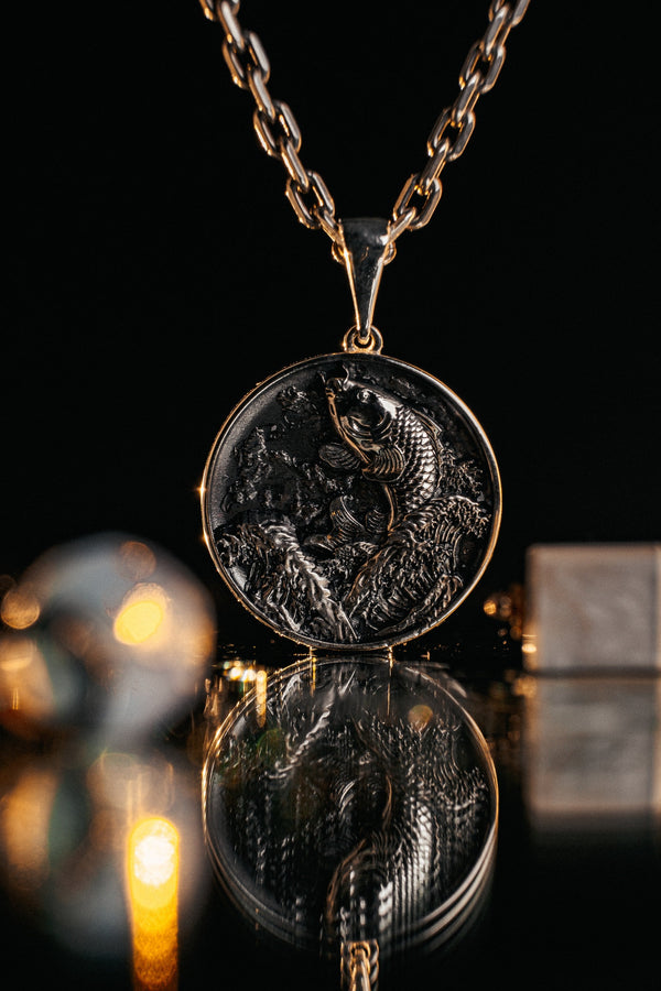This exquisite pendant showcases the graceful form of a Koi Carp, meticulously crafted in sterling silver. The intricate detailing captures the essence of these magnificent fish, from their flowing fins to their delicate scales. (etsy image id: 5077863619)