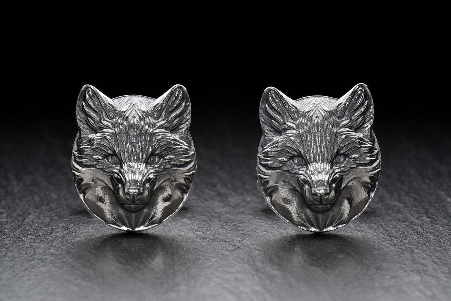 May include: A pair of silver fox head cufflinks. The cufflinks are round and feature a detailed fox head design. (etsy image id: 7689621560)