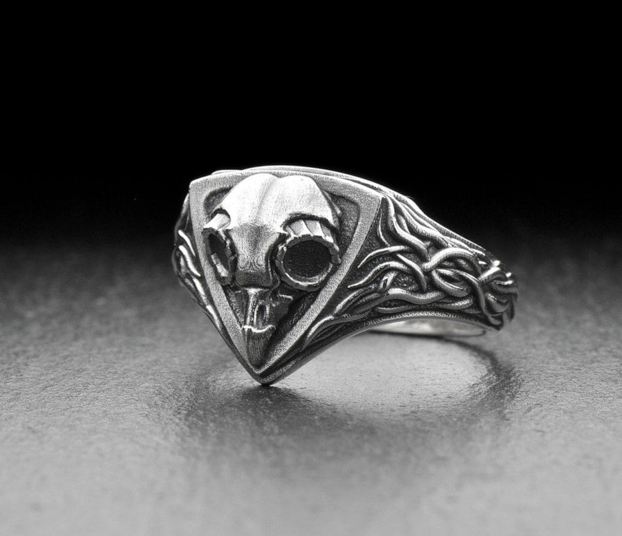 Embrace the mysteries of the night with our Sterling Silver Ring Owl Skull. This hauntingly beautiful piece is a tribute to the enigmatic and elusive spirit of the owl, a creature revered by many cultures for its wisdom and intuition. (etsy image id: 6981604606)