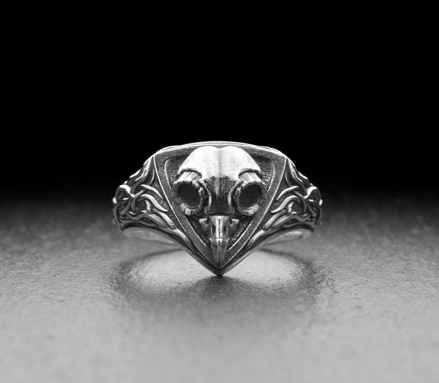 Embrace the mysteries of the night with our Sterling Silver Ring Owl Skull. This hauntingly beautiful piece is a tribute to the enigmatic and elusive spirit of the owl, a creature revered by many cultures for its wisdom and intuition. (etsy image id: 6981604606)