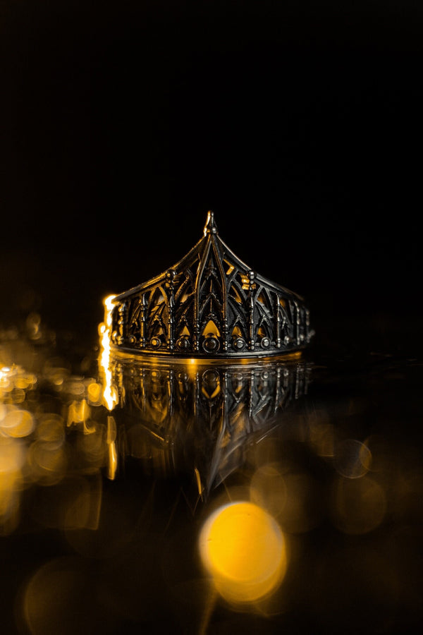 The spire represents the connection between the earth and the heavens, or high aspirations. The ribbed vaulting represents strength through structure. Wearing this ring as a "crown" on the finger symbolizes personal sovereignty and a dedication to higher ideals. It is a piece that commands respect. (etsy image id: 7976017075)