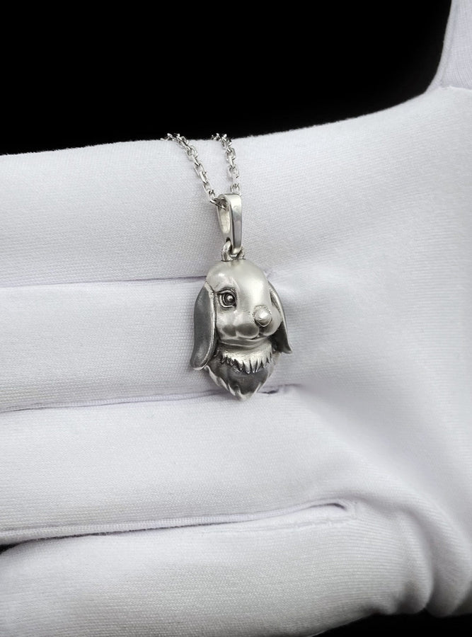 Add a touch of whimsy to your jewelry collection with our adorable Sterling Silver Bunny Pendant! Crafted with precision and attention to detail, this charming pendant features a delightful bunny motif that will capture the hearts of animal lovers and fashion enthusiasts alike. (etsy image id: 7397436045)