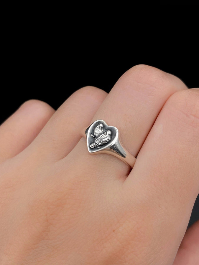 Delicate silver ring with the image of cute chickadees is the perfect accessory for all lovers of nature and animals! It will add a touch of playfulness and grace to any outfit, be it a casual look or an evening dress. (etsy image id: 7000369288)