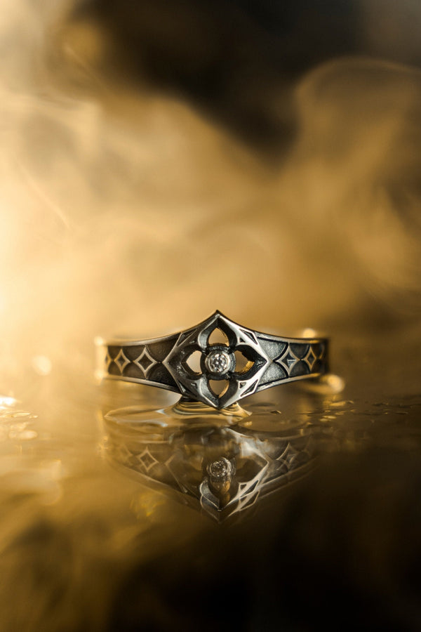 This handcrafted gothic silver ring brings together the allure of vintage design and a gemstone's sparkle, perfect for a wedding or special occasion gift. (etsy image id: 6064689690)