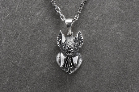 The unique bat design is a subtle nod to your dark and mysterious side, while the polished finish adds a touch of elegance. (etsy image id: 6087173409)