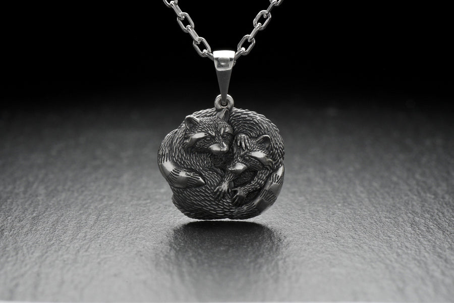 The pendant is made of high quality silver, which guarantees its durability and resistance to damage. Its unique adorable raccoon design is eye-catching and adds a pop of color to any look. (etsy image id: 6100406265)