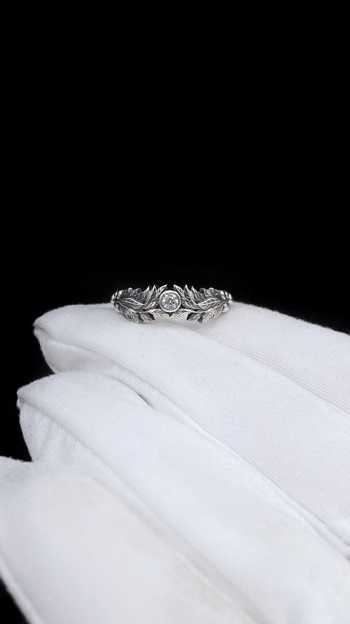 Crafted with care, this gothic silver ring with its vintage charm and gemstone centerpiece will add a touch of dark elegance to any occasion, making it a perfect gift. (etsy image id: 7463722171)