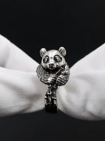 Celebrate the gentle charm of pandas with this beautifully crafted sterling silver panda ring. Designed with intricate detail, this ring captures the playful and endearing spirit of one of nature's most beloved creatures. (etsy image id: 6483013394)