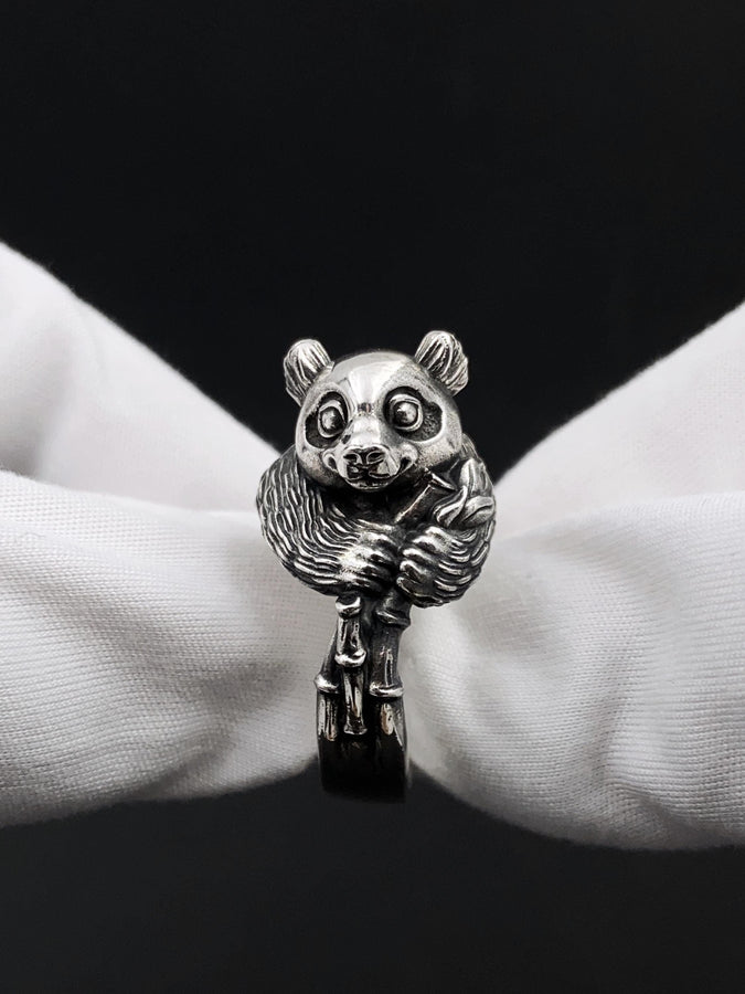 Celebrate the gentle charm of pandas with this beautifully crafted sterling silver panda ring. Designed with intricate detail, this ring captures the playful and endearing spirit of one of nature's most beloved creatures. (etsy image id: 6483013394)