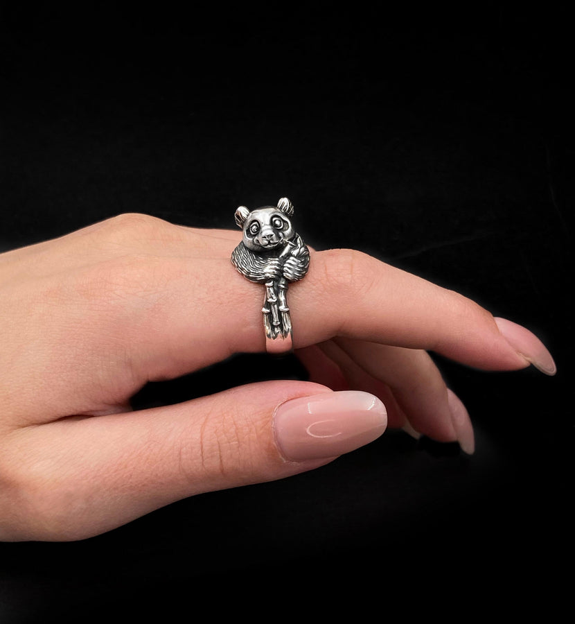 Celebrate the gentle charm of pandas with this beautifully crafted sterling silver panda ring. Designed with intricate detail, this ring captures the playful and endearing spirit of one of nature's most beloved creatures. (etsy image id: 6483013394)