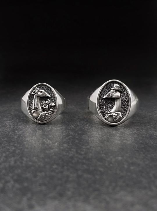 Sterling Silver Unique Goose Wedding Rings Set
Handmade silver couple rings with bird motifs
Animal-inspired wedding bands with humor

Sterling goose rings as anniversary gift

Whimsical bird signet rings for couples

Quirky and symbolic goose couple rings
Goose gentleman and lady ring set for soulmates
Goose Couple Rings

Animal Love Rings

Vintage Bird Rings

Funny Goose Rings

Sterling Goose Set

Goose Wedding Set

ArtFox Jewelry