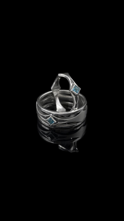 A perfect blend of vintage gothic design and modern elegance, this sterling silver ring with its gemstone centerpiece is a stunning addition to any jewelry collection. (etsy image id: 6911153908)