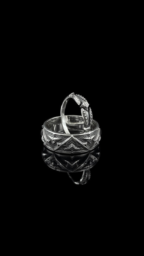 Gothic elegance meets medieval soul.
This handcrafted gemstone ring is designed for those who walk a different path — bold, timeless, and unforgettable.

gothic heraldic crest wedding ring set

sterling gothic armor vow bands for couples

medieval knight wedding rings with shield motif
Gothic architectural wedding bands for old-soul lovers
Symbolic crown and shield rings in silver
armor inspired gothic couple rings with arrow details
silver chevr