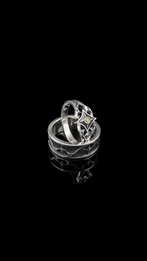 Crafted with precision, this gothic silver ring showcases a bold gemstone and intricate detailing. Perfect for adding a touch of vintage allure to your look. (etsy image id: 7026444785)
