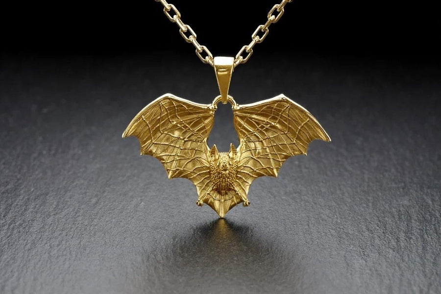 Featuring a detailed bat with outstretched wings, our unique design is sure to stand out. Don't let the darkness keep you down—power up your style with a silver bat pendant today! (etsy image id: 6086867201)
