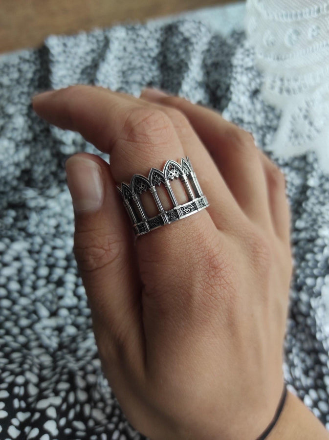 Sterling Silver Gothic Ring, Vintage Ring, Engagement Ring, Handmade Medieval Jewelry, Mens Ring, Unique Womens Gift, Gift Idea, Unique Ring, This angle demonstrates the "openwork" illusion of the design. While the ring is a solid band, the deep relief casting creates the appearance of a hollow gallery or walkway. The repetition of the arches is mathematically precise, mirroring the rhythm of a Gothic nave. It showcases a mastery of arc (etsy image id: 7305776203)