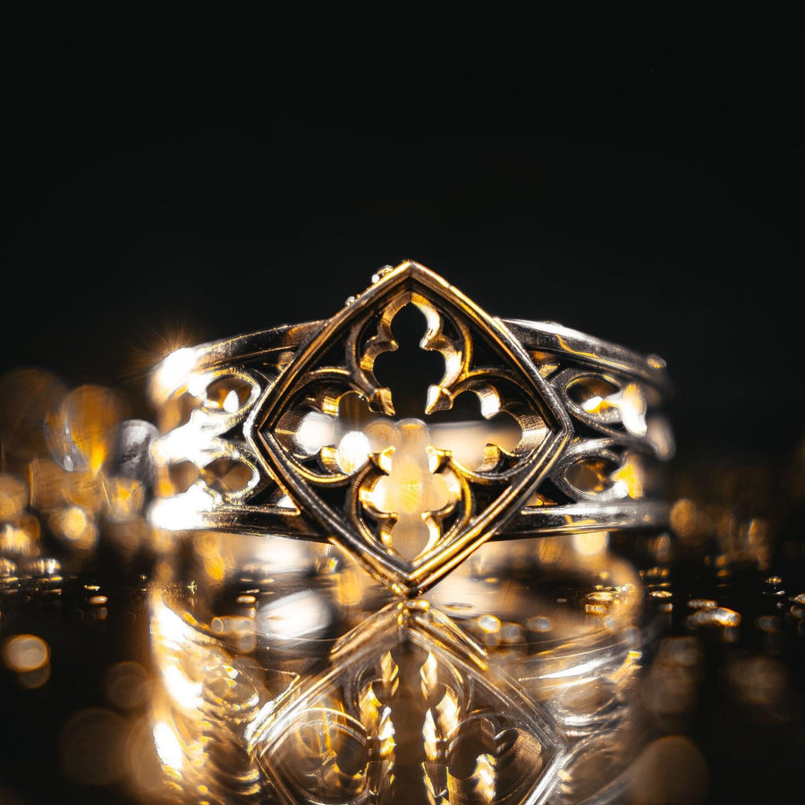 Detailed view of the ring's texture, showing the stippled, hammered finish inside the recessed arches. This "granulation" effect adds a raw, artisan quality to the piece, distinguishing it from mass-produced jewelry. The 925 sterling silver has been treated with sulfur to achieve a permanent dark patina in the low points, ensuring the architectural pattern remains visible even with daily wear. The metal looks solid and durable, suit (etsy image id: 6980758746)
