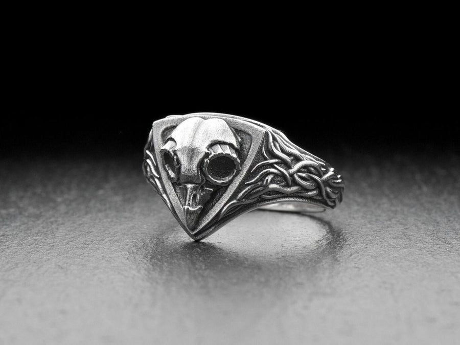 Embrace the mysteries of the night with our Sterling Silver Ring Owl Skull. This hauntingly beautiful piece is a tribute to the enigmatic and elusive spirit of the owl, a creature revered by many cultures for its wisdom and intuition. (etsy image id: 6981604606)