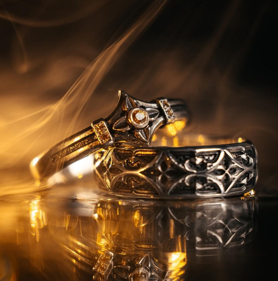 Bathed in soft, romantic light against elegant white silk, this alternative bridal set perfectly balances dark gothic architecture with traditional wedding luxury. The rings evoke a mysterious, dark academia atmosphere, capturing the timeless beauty of ancient stone cathedrals and eternal devotion. Designed for modern couples who appreciate history and non-traditional aesthetics, this matching wedding set is a profound symbol of a love story root (etsy image id: 7928015292)