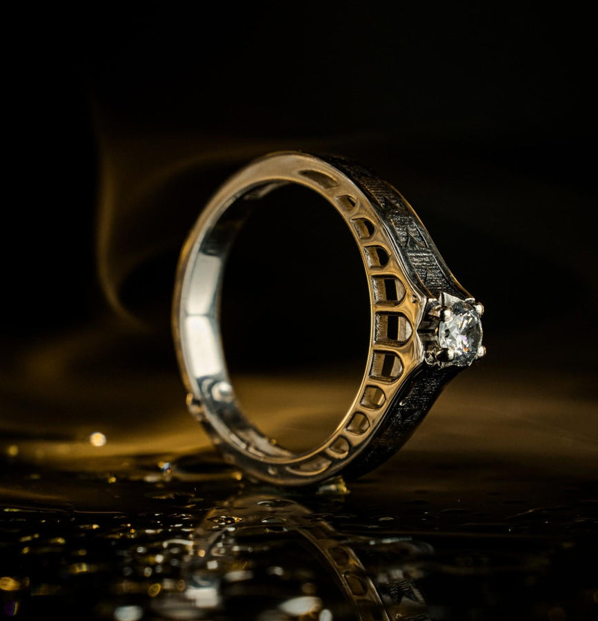 A professional studio photograph of a matching two-piece sterling silver wedding ring set. Both rings feature a prominent, raised Greek-style cross motif in the center, which holds a round, bezel-set white crystal. The interior of the cross arms has a fine, cross-hatched grid texture. Along the sides of the high-polished silver bands are recessed, four-lobed quatrefoil shapes. The rings are presented against a pitch-black background, making the p __etsy:8051335185