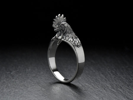 Show off your unique style with a Rooster Silver Ring! Handcrafted and made from sterling silver, this ring is the perfect addition to any outfit. (etsy image id: 6995523004)