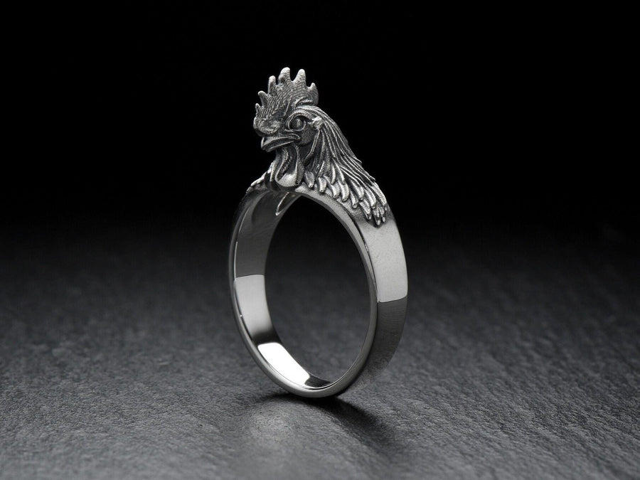 Show off your unique style with a Rooster Silver Ring! Handcrafted and made from sterling silver, this ring is the perfect addition to any outfit. (etsy image id: 6995523004)
