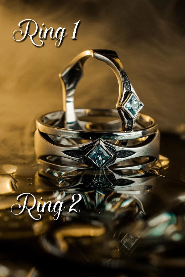 This Art Deco wedding ring set features a sterling silver engagement ring and matching band with bold geometric cutouts and a bright blue square gemstone. The clean lines, layered shapes, and sculptural silhouette create a modern yet vintage feel ideal for couples seeking unique, architecturally inspired bridal jewelry captured on a reflective surface for elegant presentation.