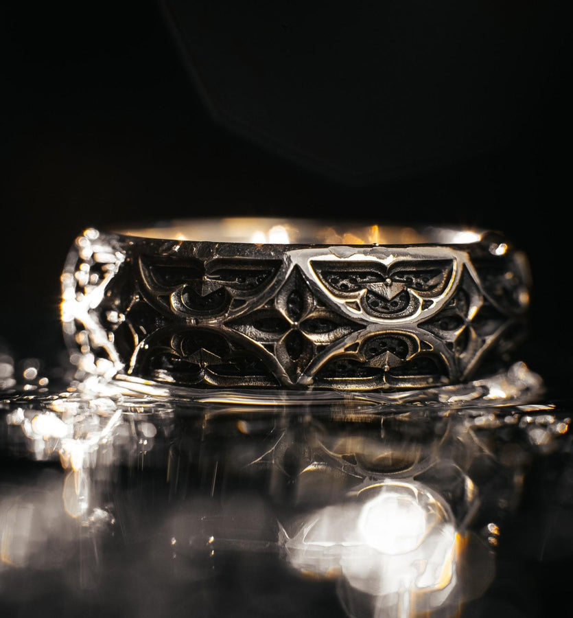 Bathed in soft, romantic light against elegant white silk, this alternative bridal set perfectly balances dark gothic architecture with traditional wedding luxury. The rings evoke a mysterious, dark academia atmosphere, capturing the timeless beauty of ancient stone cathedrals and eternal devotion. Designed for modern couples who appreciate history and non-traditional aesthetics, this matching wedding set is a profound symbol of a love story root (etsy image id: 7928015292)
