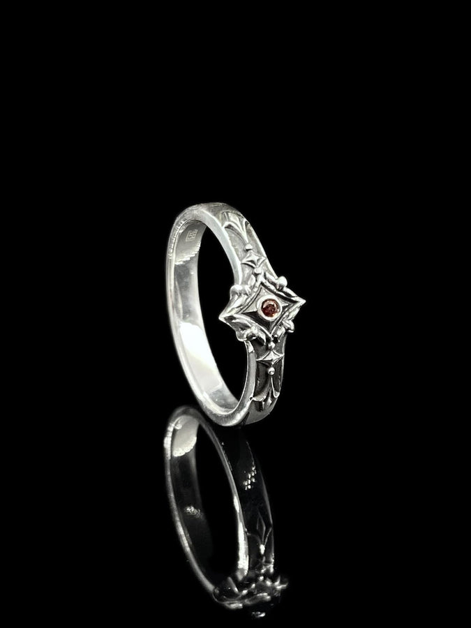 Featuring intricate gothic motifs and a mesmerizing gemstone, this silver ring is a one-of-a-kind piece that will captivate anyone with an eye for unique, elegant jewelry. (etsy image id: 7375563764)