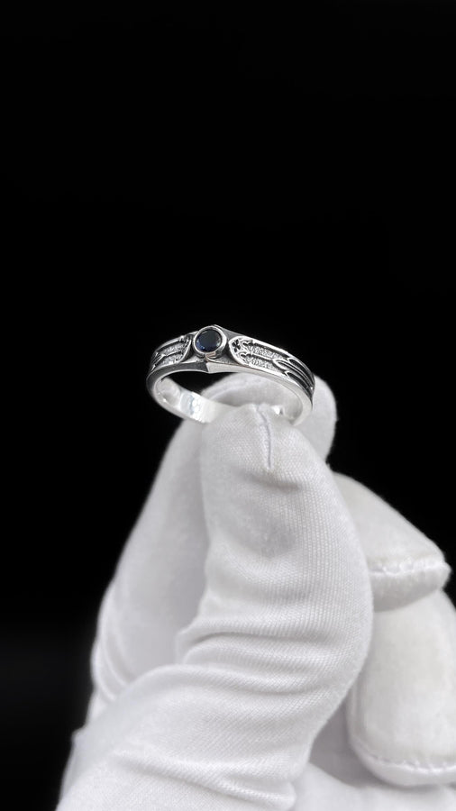 This gothic sterling silver ring features a vivid red garnet set in a detailed medieval-inspired band with darkened textures and graceful, pointed motifs. Designed for lovers of fantasy, gothic fashion, and artisan jewelry, it offers an elegant yet dramatic look. Perfect as a unique wedding band, engagement ring, or statement piece for anyone drawn to symbolic and timeless gothic style. (etsy image id: 7425901470)