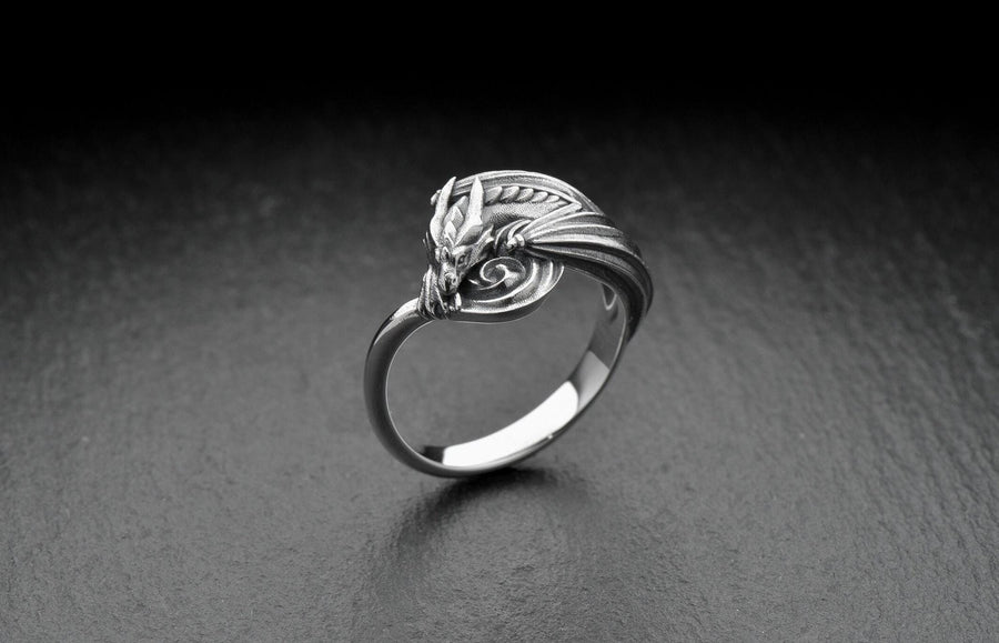 Every dragon lover deserves one of these antique-style silver rings. Inspired by Asian legend, this ring's design is astonishingly detailed. Imagine it sitting inside the palm of your hand. (etsy image id: 7099320726)