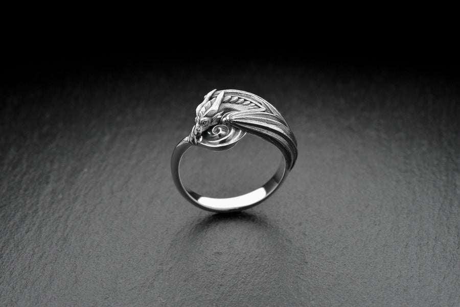 Every dragon lover deserves one of these antique-style silver rings. Inspired by Asian legend, this ring's design is astonishingly detailed. Imagine it sitting inside the palm of your hand. (etsy image id: 7099320726)