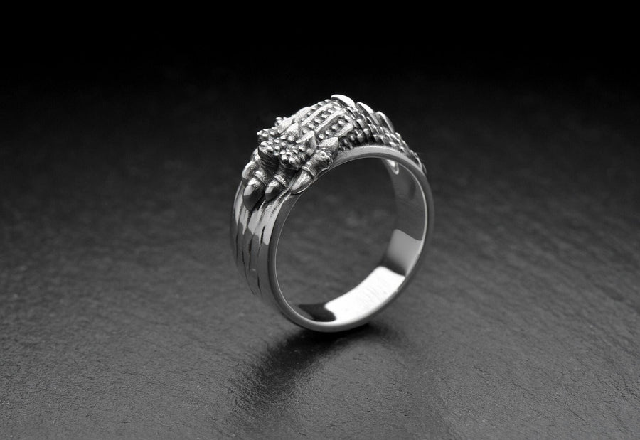 Made with high-quality sterling silver, this ring is both stylish and durable. Whether you're dressing up for a night out or adding a touch of edge to your everyday look, this ring is the perfect accessory. (etsy image id: 7099610710)