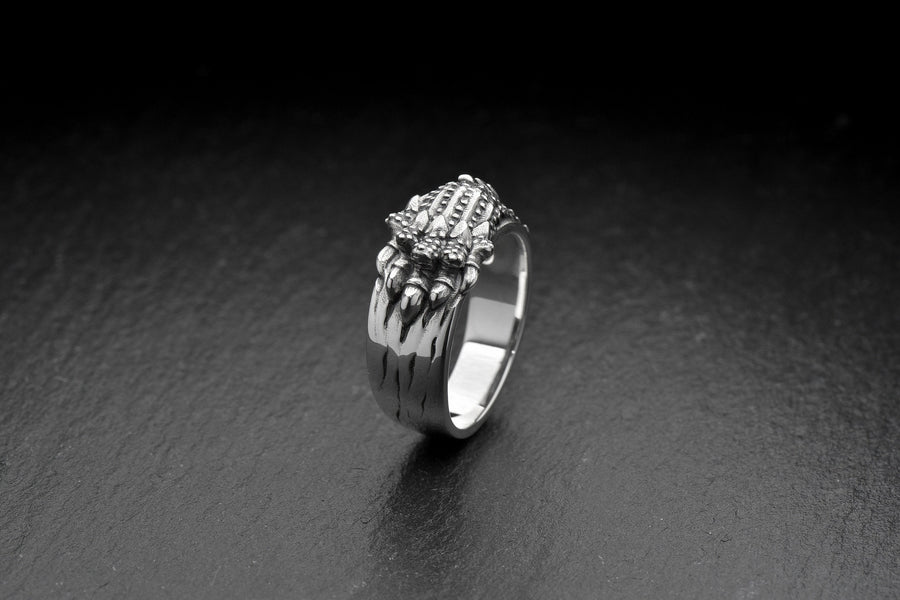 Made with high-quality sterling silver, this ring is both stylish and durable. Whether you're dressing up for a night out or adding a touch of edge to your everyday look, this ring is the perfect accessory. (etsy image id: 7099610710)