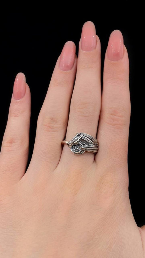 Every dragon lover deserves one of these antique-style silver rings. Inspired by Asian legend, this ring's design is astonishingly detailed. Imagine it sitting inside the palm of your hand. (etsy image id: 7099320726)