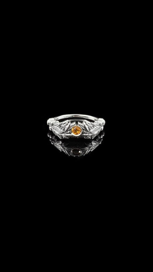 Crafted with care, this gothic silver ring with its vintage charm and gemstone centerpiece will add a touch of dark elegance to any occasion, making it a perfect gift. (etsy image id: 7463722171)