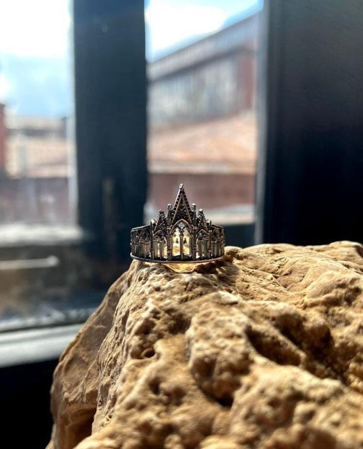 We have rings for people who love to explore the great outdoors, as well as those who love to stay in. With memories and kindness. The image highlights the "chiselled" quality of the 925 sterling silver. The ridges of the rooflines and pillars are sharp and defined, while the background surfaces have a textured, grainy finish like limestone. The oxidation is applied carefully to the "windows" and "doors" of the cathe (etsy image id: 4211827296)