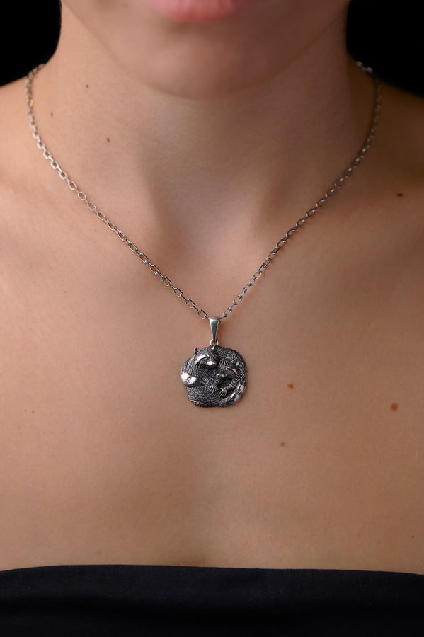 The pendant is made of high quality silver, which guarantees its durability and resistance to damage. Its unique adorable raccoon design is eye-catching and adds a pop of color to any look. (etsy image id: 6100406265)