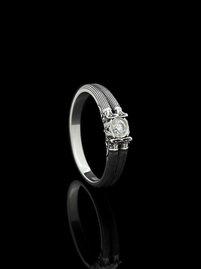 A handcrafted sterling silver ring inspired by ancient Greek architecture, featuring vertical column grooves and a raised stone bezel. The Art Deco influence enhances the structured design, giving it a refined yet historical appearance. Excellent for proposal moments, themed weddings, or collectors who love architectural motifs in fine jewelry. (etsy image id: 6163725531)
