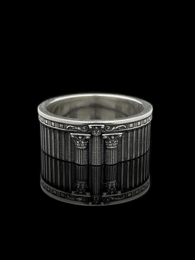 A handcrafted silver band ring with an ancient architectural theme. The carved columns and decorative patterns resemble historic Greek structures, giving the jewelry a symbolic and powerful presence. The design suits collectors of classical art, mythology enthusiasts and anyone who values bold and meaningful accessories. (etsy image id: 7417729506)