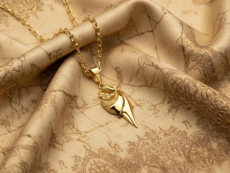 Reimagined in solid 14k yellow gold, this flying fox pendant transforms from a creature of the night into a radiant, sunlit treasure. The warm golden metal mimics the golden-brown fur of real flying foxes, giving the sculpture a lifelike, opulent glow. The deep recesses are treated with a soft matte finish rather than black oxidation, highlighting the intricate fur and wing details with a softer, more luxurious contrast. A magnificent piece of fi (etsy image id: 7419785191)