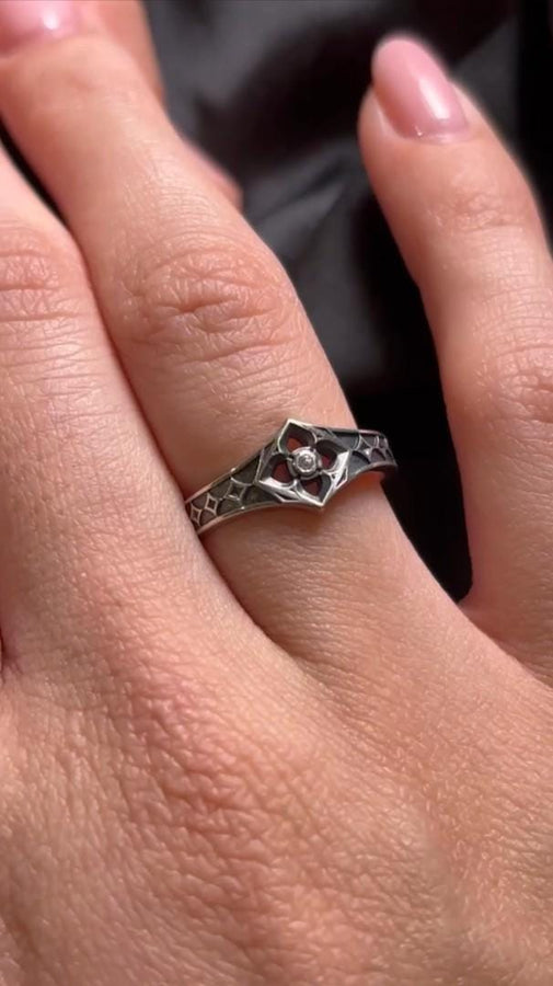 This handcrafted gothic silver ring brings together the allure of vintage design and a gemstone's sparkle, perfect for a wedding or special occasion gift. (etsy image id: 6064689690)