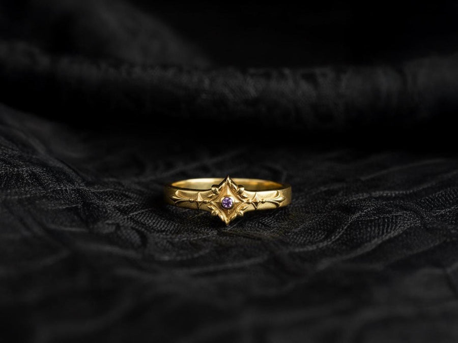 Featuring intricate gothic motifs and a mesmerizing gemstone, this silver ring is a one-of-a-kind piece that will captivate anyone with an eye for unique, elegant jewelry. (etsy image id: 7375563764)