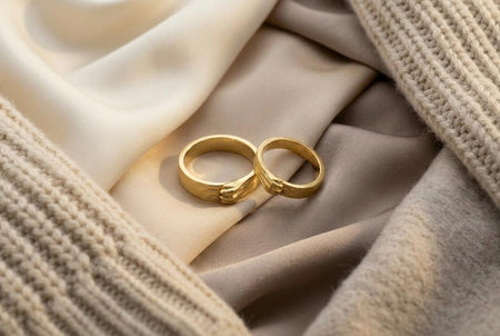 Golden gothic claw wedding rings crafted in warm yellow gold, featuring sculpted claw designs that wrap elegantly around each band. The polished gold surface enhances the dramatic shape and symbolic meaning of the claws, representing devotion and protection. Perfect for gothic, fantasy, or alternative couples seeking a luxurious and expressive wedding or engagement ring set with a unique handcrafted presence.