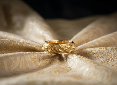 A luxurious 14k gold version of the Gothic Cathedral ring. The warm, yellow  gold transforms the medieval design into something regal and ecclesiastical, reminiscent of a bishop's ring or a royal relic. The recesses are matte-finished to provide contrast without the black oxidation, allowing the golden arches to shine brilliantly. This piece radiates warmth and opulence, turning the rugged architectural motif into a sophisticated fine jewelry (etsy image id: 7430796178)