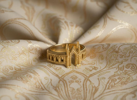 The Gatehouse ring is reimagined in 14k Yellow Gold. The transformation turns the "Iron Fortress" into the "Gates of Heaven." The warm metal makes the twin spires glow like a celestial palace. This version feels divine and triumphant, perfect for a milestone gift symbolizing arriving at a hard-won destination. (etsy image id: 7450292466)